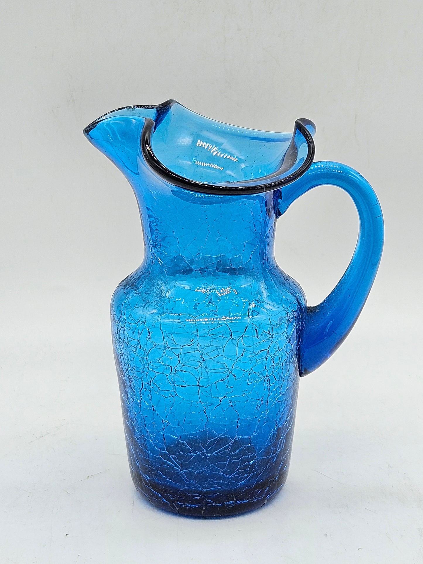 Small antique jag blue glass with craquelure