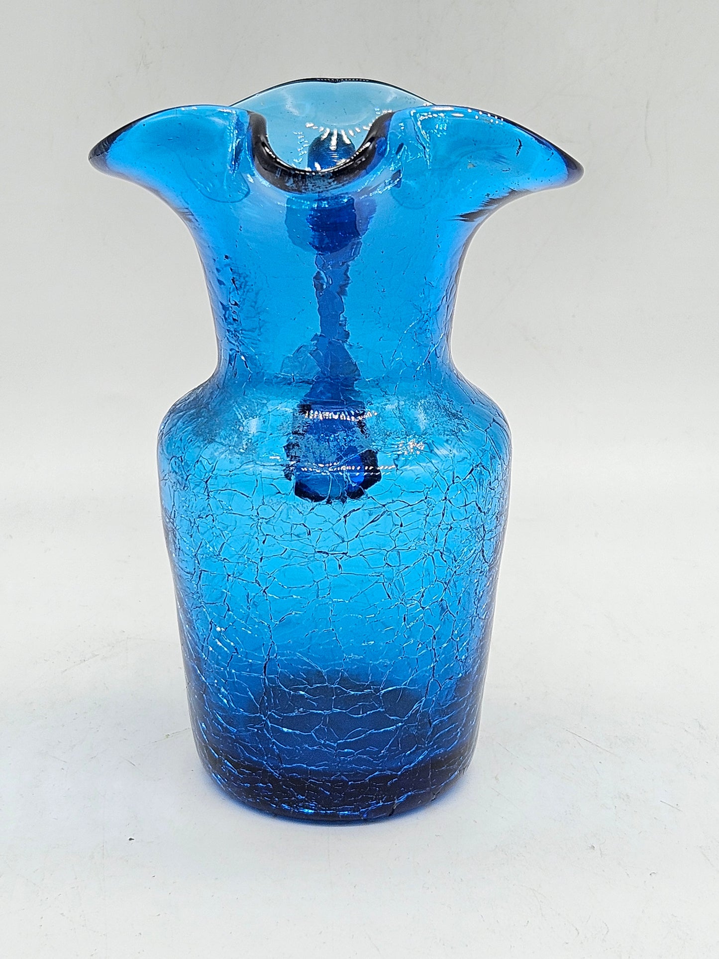 Small antique jag blue glass with craquelure