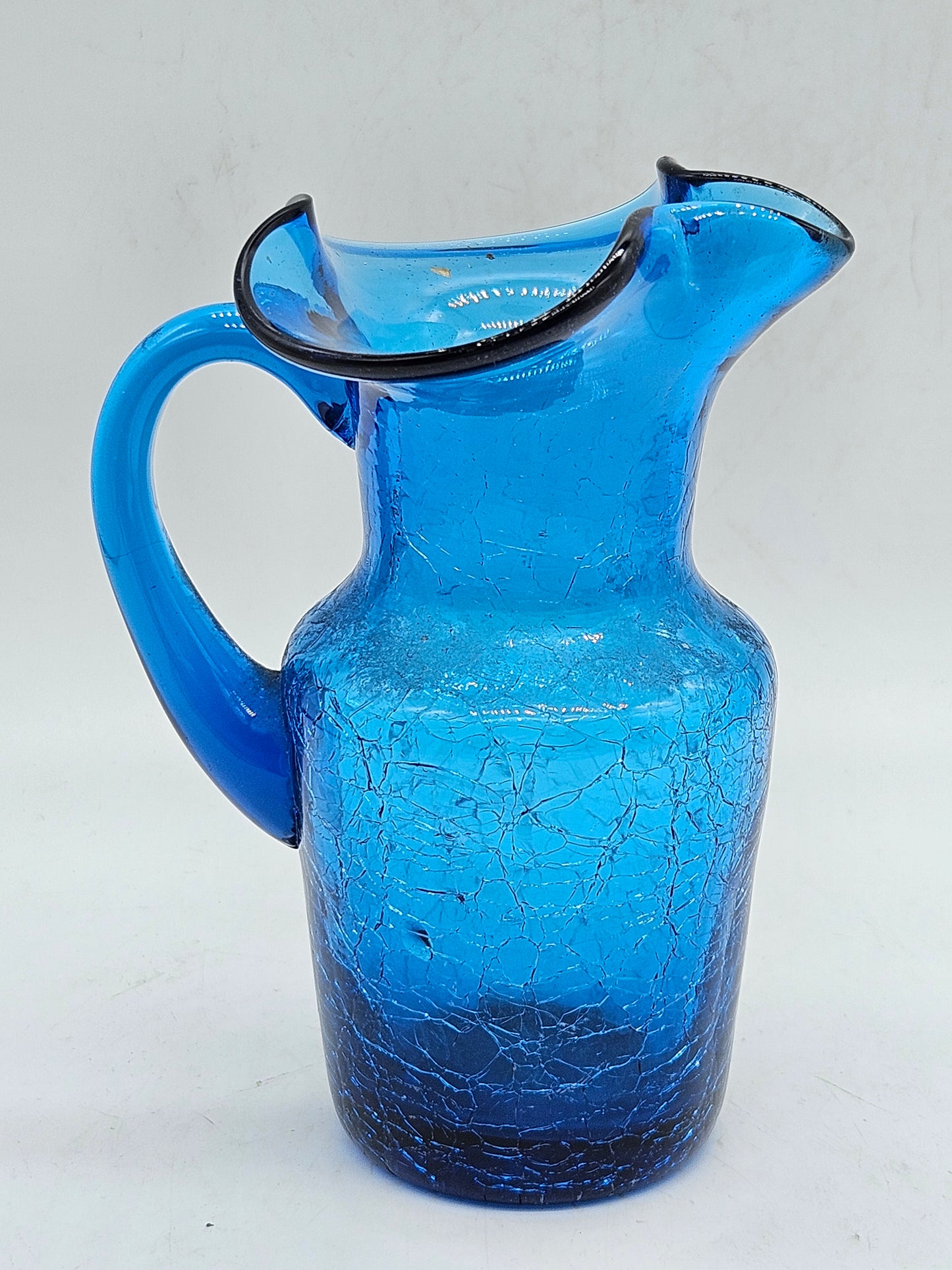 Small antique jag blue glass with craquelure