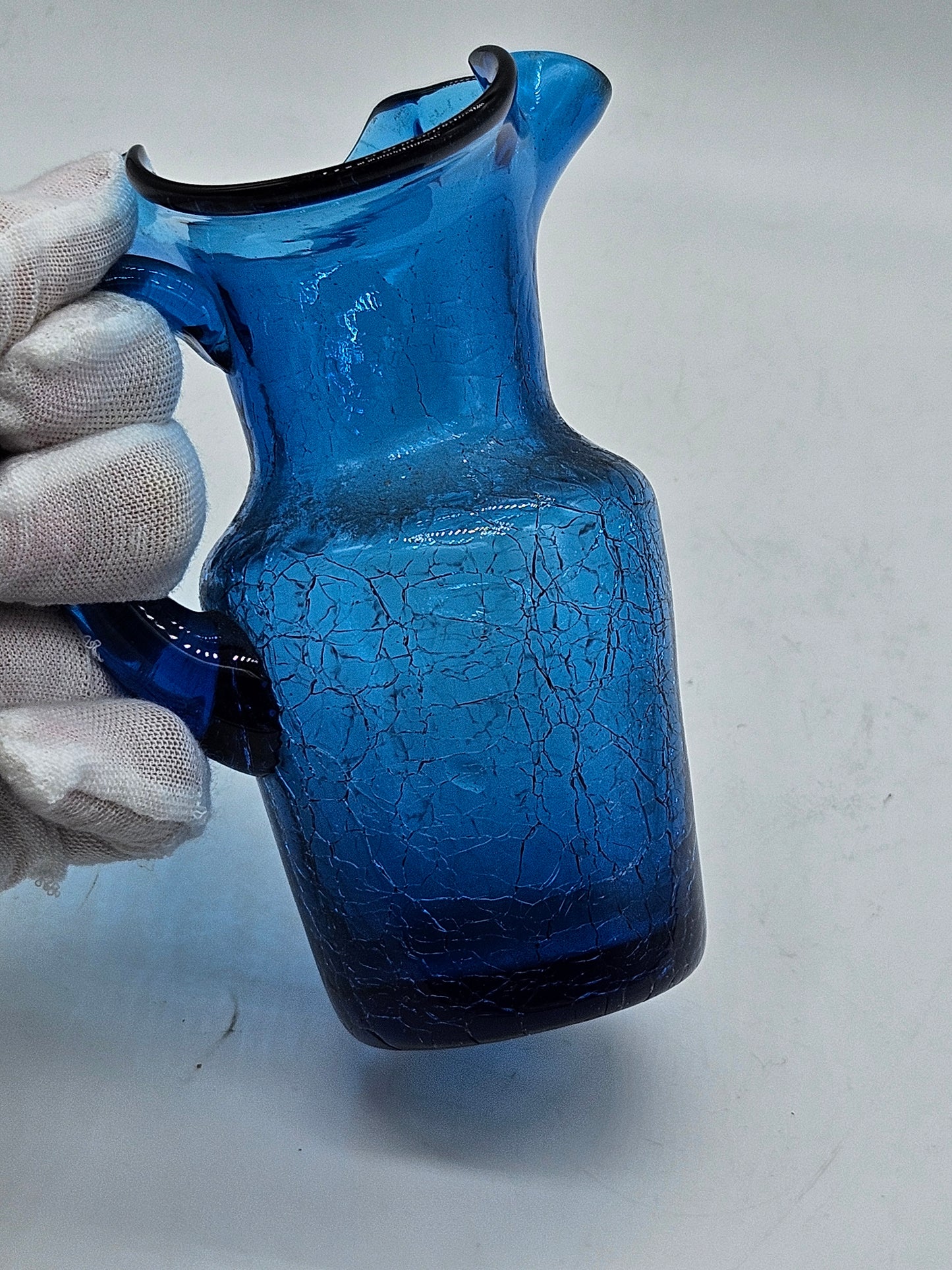 Small antique jag blue glass with craquelure
