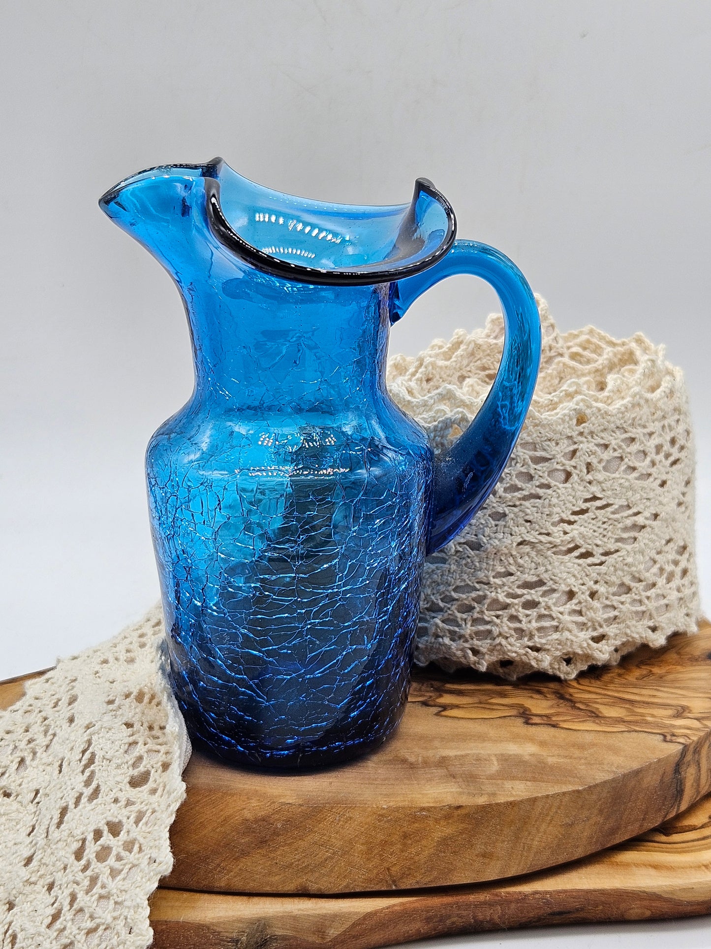 Small antique jag blue glass with craquelure